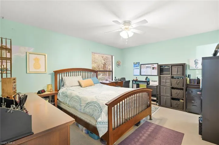 Bedroom featuring a ceiling fan