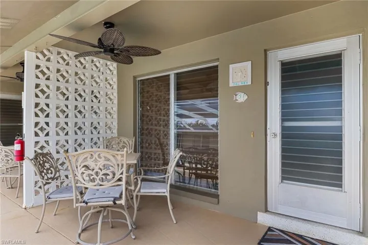 Del Ray Unit view of patio / terrace with outdoor dining area and a ceiling fan.