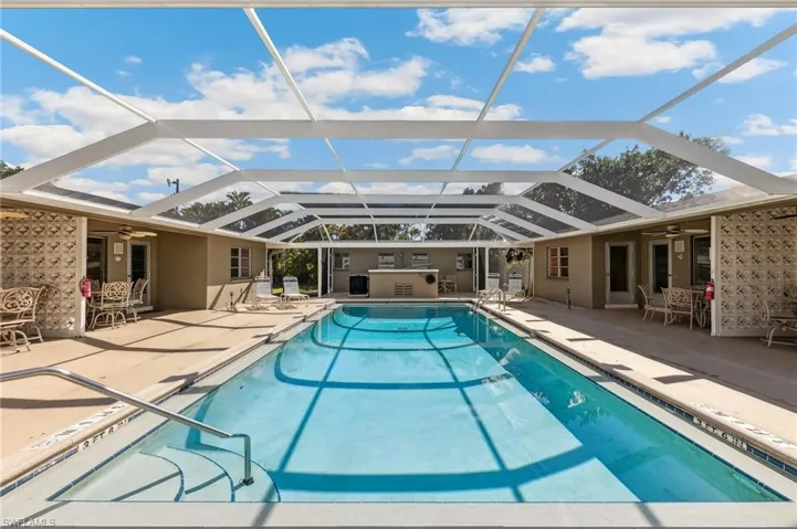 Fully screened community pool with unit lanai's/patios, and ceiling fans