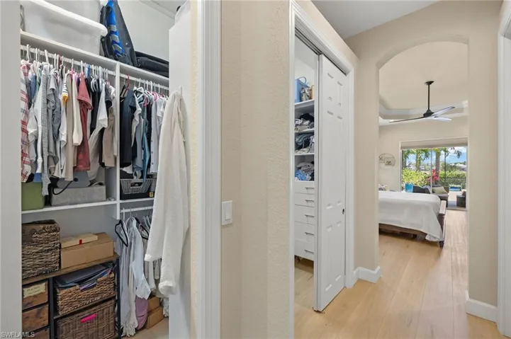 His & Her Closets designed by California Closets