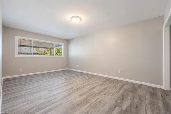 Spare room featuring light hardwood / wood-style flooring