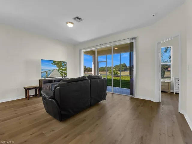 Great Room w/ Large Panel Sliders To Lanai