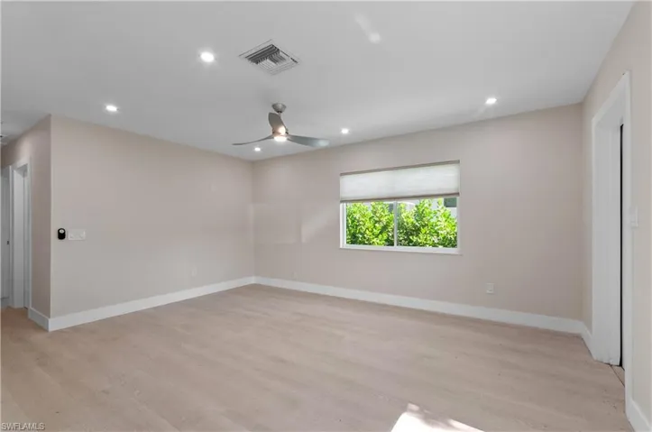 #1 bedroom featuring light wood-style floors, recessed lighting, and a ceiling fan
