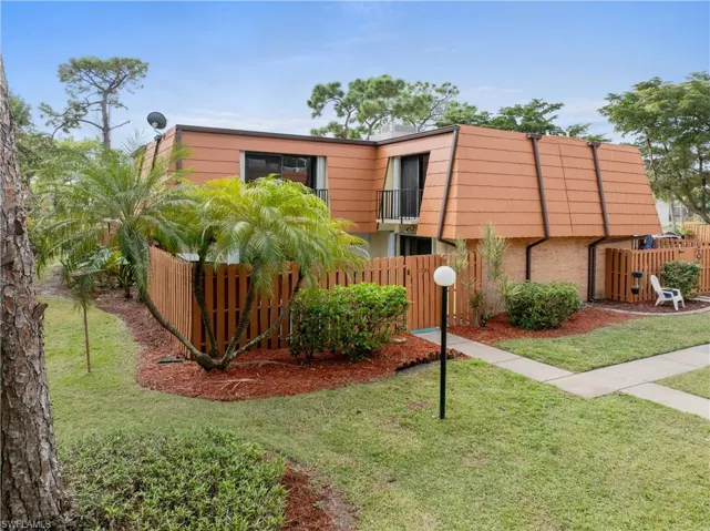 View of front of property featuring a balcony