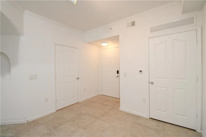 Empty room with ornamental molding