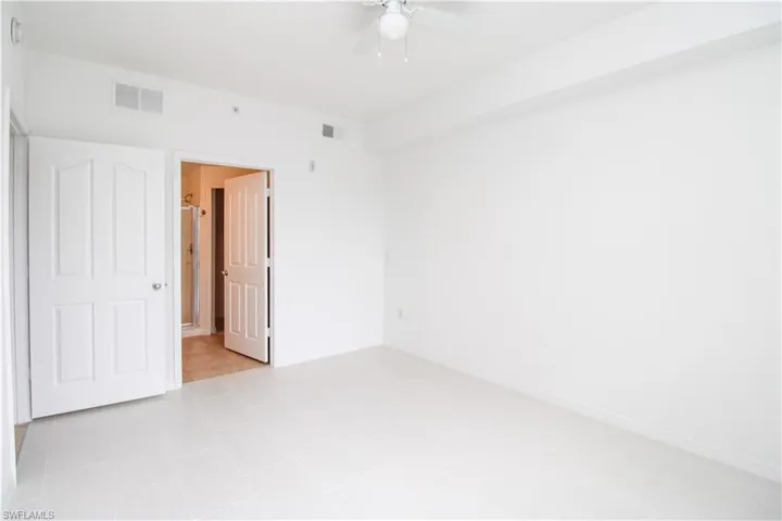 Unfurnished room featuring ceiling fan