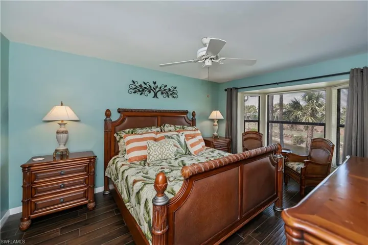 Primary Bedroom with Lake and Golf Course