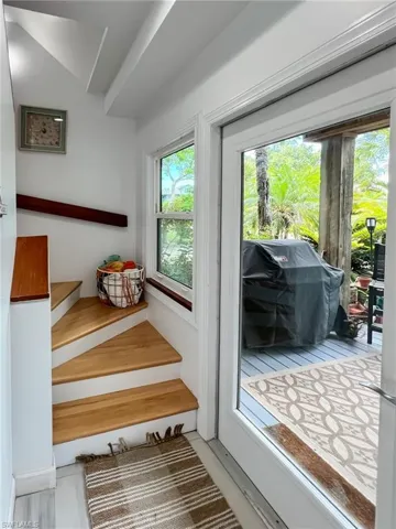 Stairs featuring plenty of natural light