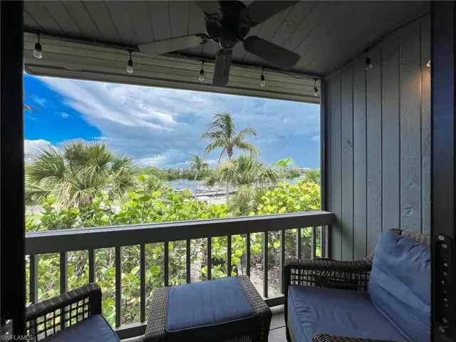 Balcony featuring ceiling fan
