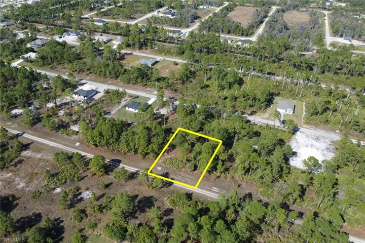 Aerial overview of property's location featuring property parcel outlined