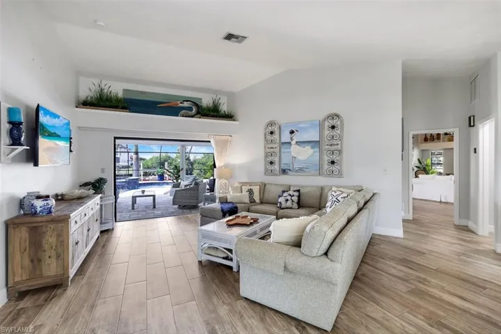 FRONT LIVING ROOM OVERLOOKING POOL