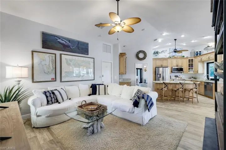 BACK LIVINGROOM OPEN TO KITCHEN/DINING