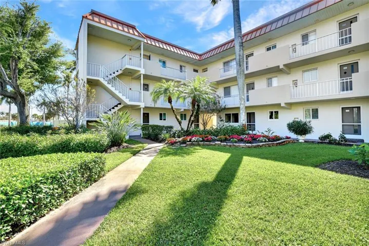 View of apartment building / complex featuring stairway