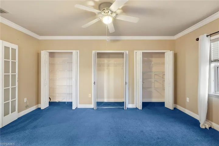 A lot of closet space & crown moulding