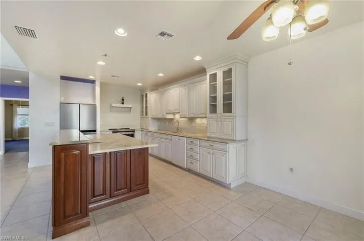 The rich, dark wood cabinets are a very nice accent