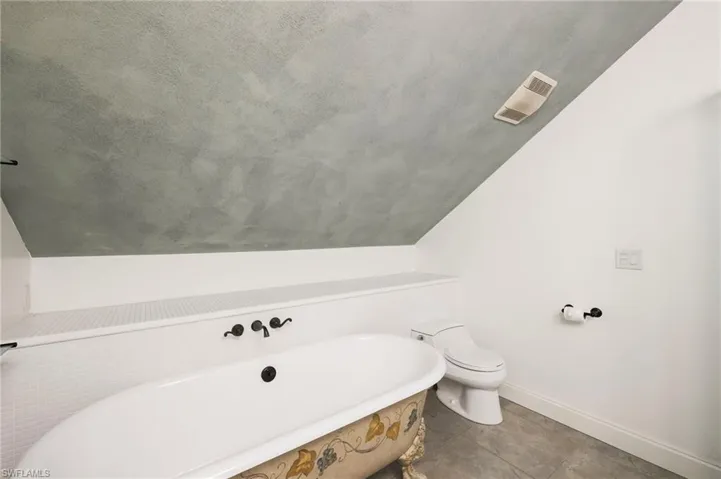 A big claw foot soaking tub is reminiscent of a simpler time