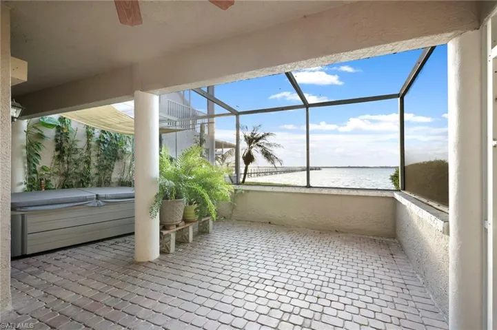 Enjoy this waterfront oasis while hot tubbing on those cooler evenings