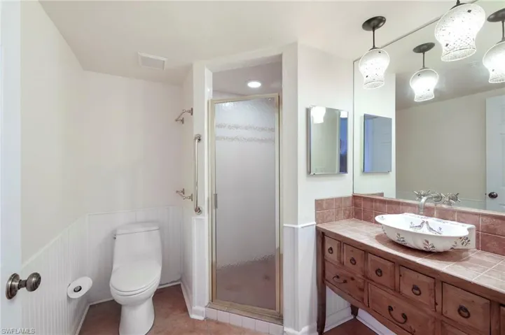 The bottom floor guest bathroom with easy access stand-up shower