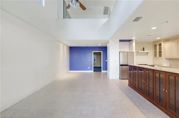 A large living room space with riverfront views