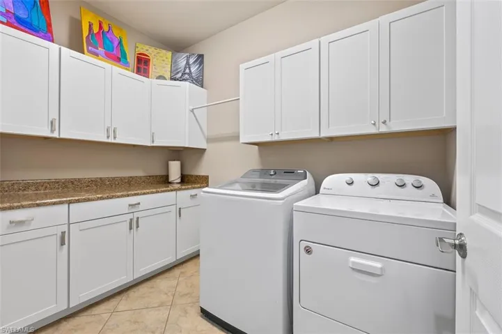 Laundry Room with cabinetry and hanging area.