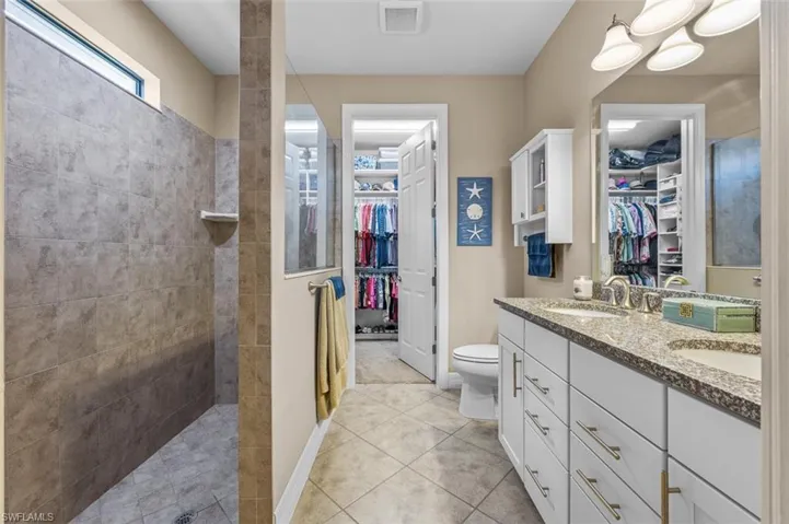 Primary Bath with dual sinks, walk-in closet