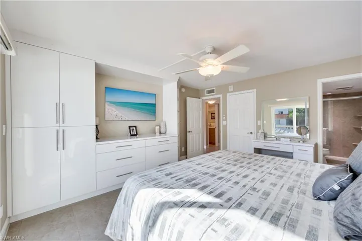 Bedroom featuring a ceiling fan and light tile patterned floors