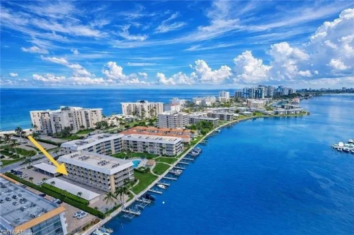 View of urban area featuring a nearby body of water