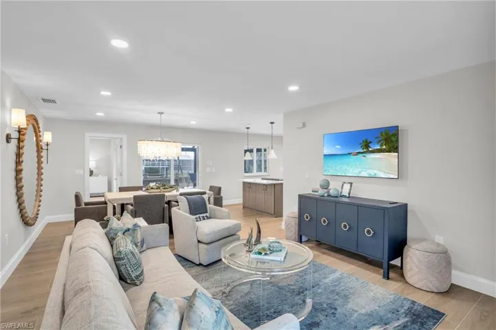 Can you smell the freshness?!  Totally refreshed from the studs out.  Kitchen Island, entertaining dining area and the spacious family area.....all included