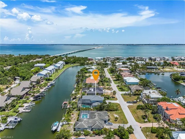 Aerial view of residential area with a large body of water