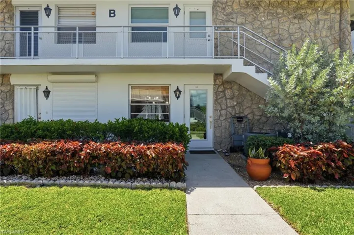 FRONT ELEVATION AND ENTRY TO B1 RESIDENCE...