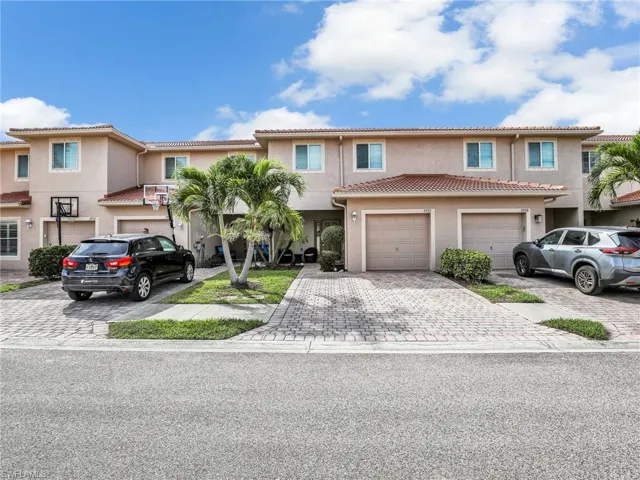 Tile Roof and Paver Driveway