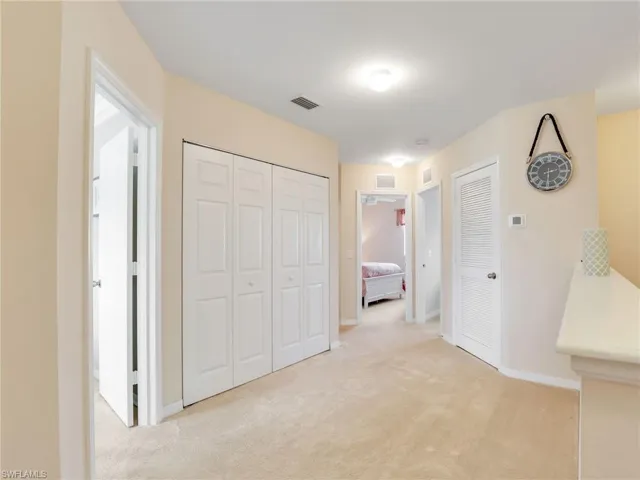 Double doors lead to laundry
