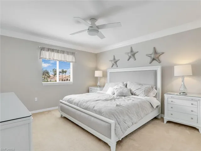 Master Bedroom carpet floors and crown molding with new Hunter fan