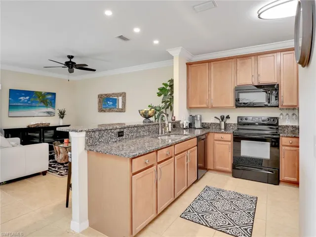 Large Kitchen with Breakfast bar, granite counters and newer appliances