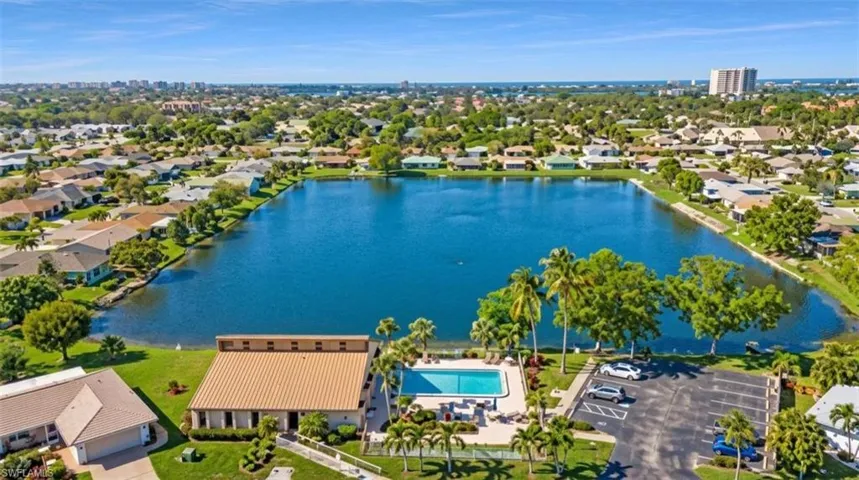 Aerial view of residential area with a large body of water