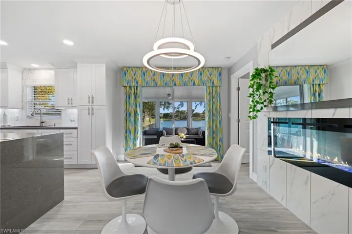 Dining room with suspended lighting