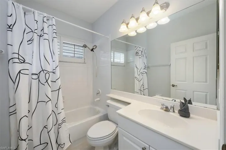Full bath with shower / tub combo and vanity