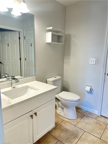 Bathroom featuring vanity and light tile patterned flooring