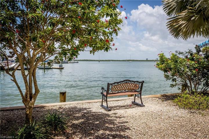 Watch the river activity from this bench.