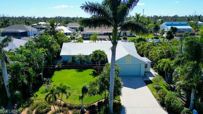 Aerial of front elevation showing professional landscaping