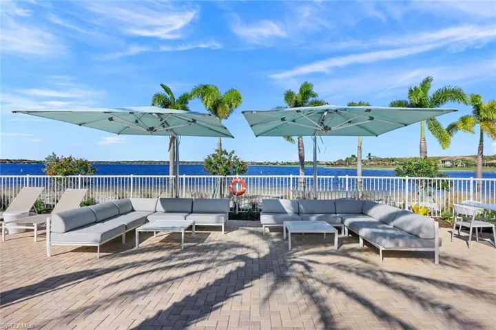View of patio / terrace featuring outdoor lounge area and a water view