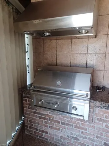 Detailed view of extractor fan and wood walls