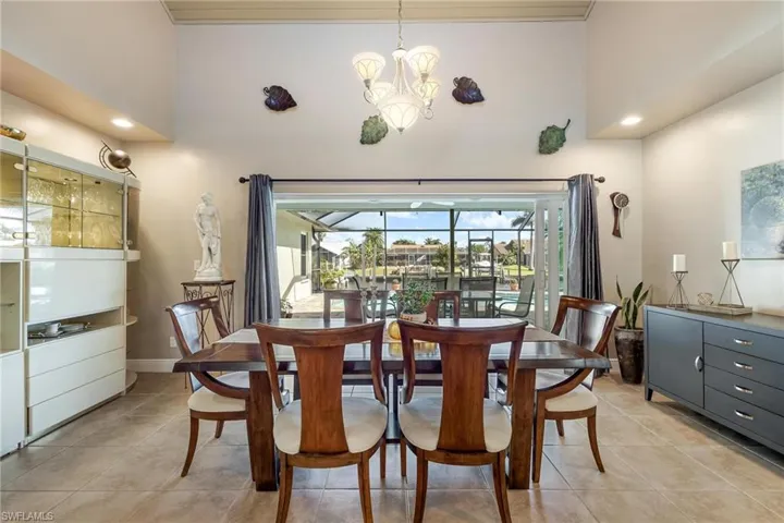 Enjoy family meals with views of your screened-in lanai with canal views - or make this your living room