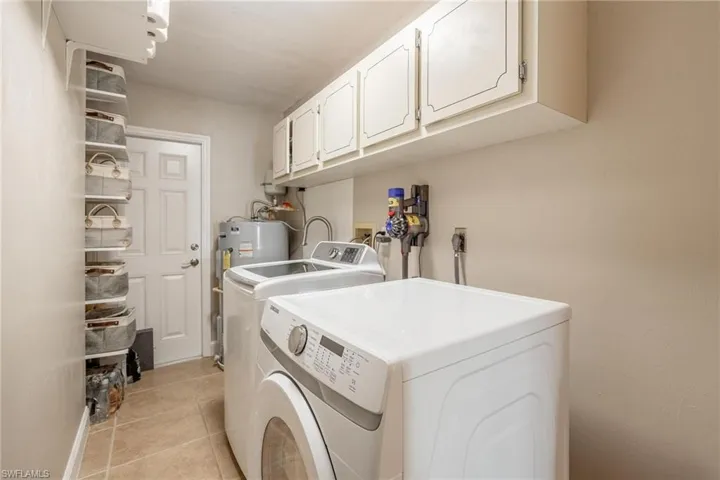 Laundry room with plenty of storage space!