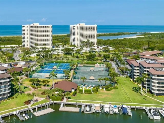 Bird's eye view of a large body of water and apartment complex