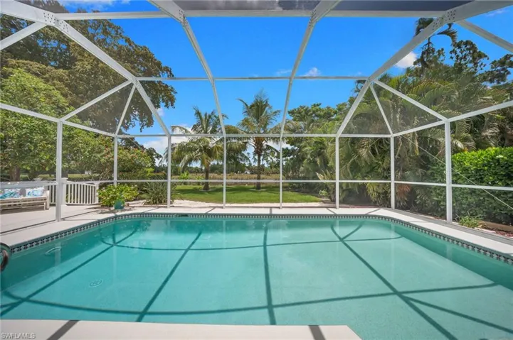 Screened pool enclosure with stunning nature views
