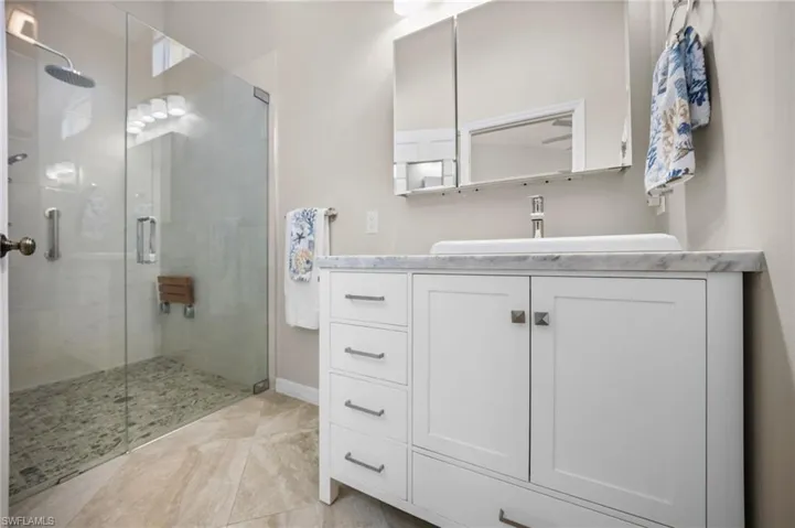 Ensuite primary bathroom with spa-inspired shower