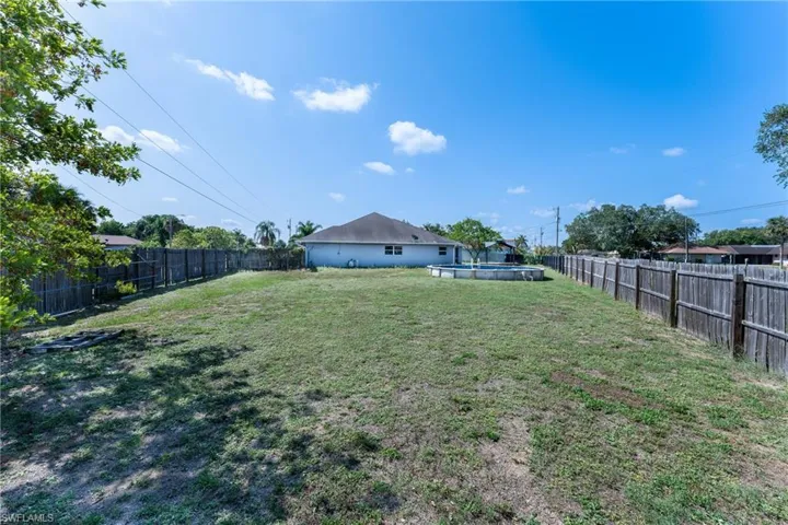 View of yard featuring a fenced in pool