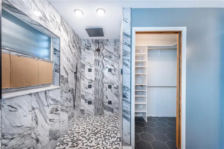 Bathroom featuring tile flooring