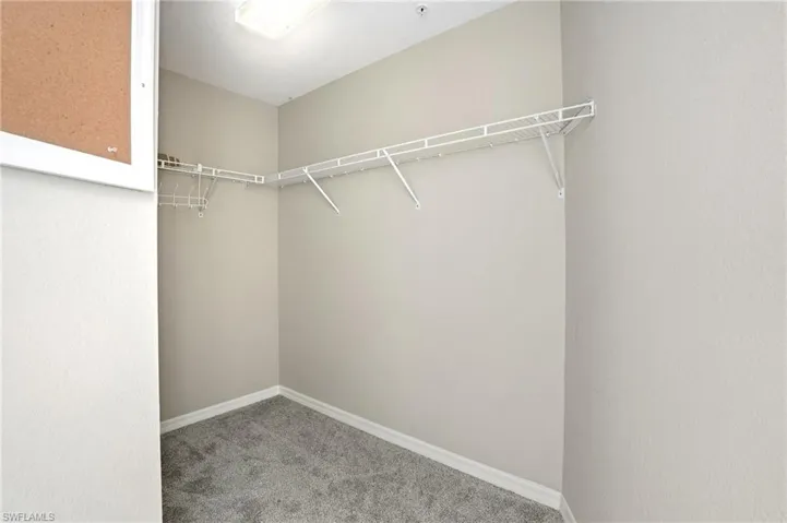 One of two walk in closets - Virtually Edited Image